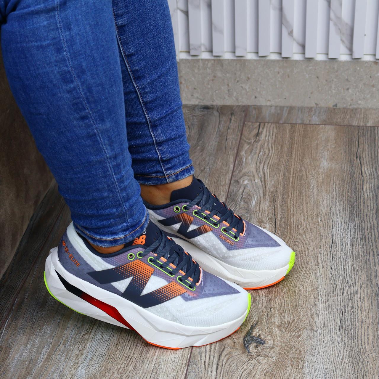 NEW BALANCE FUELCELL GRIS ROJO