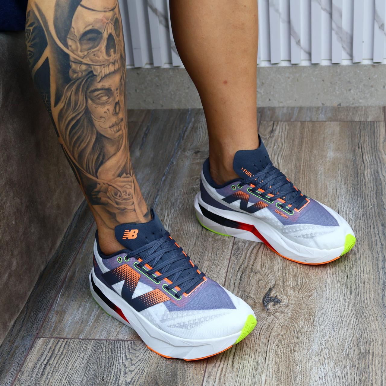 NEW BALANCE FUELCELL GRIS ROJO