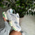 NEW BALANCE 9060 GRIS CON VERDE