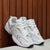 NEW BALANCE 530 BLANCO DORADO