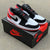 JORDAN RETRO 1 LOW ROJO BLANCO