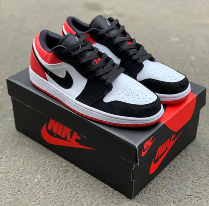 JORDAN RETRO 1 LOW ROJO BLANCO